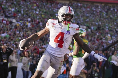 No. 6 Ohio State routs top-ranked Oregon 41-21 in the Rose Bowl, advances to CFP semifinals