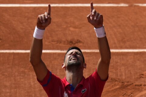 Novak Djokovic stands alone at the Australian Open now that Rafael Nadal and Roger Federer retired