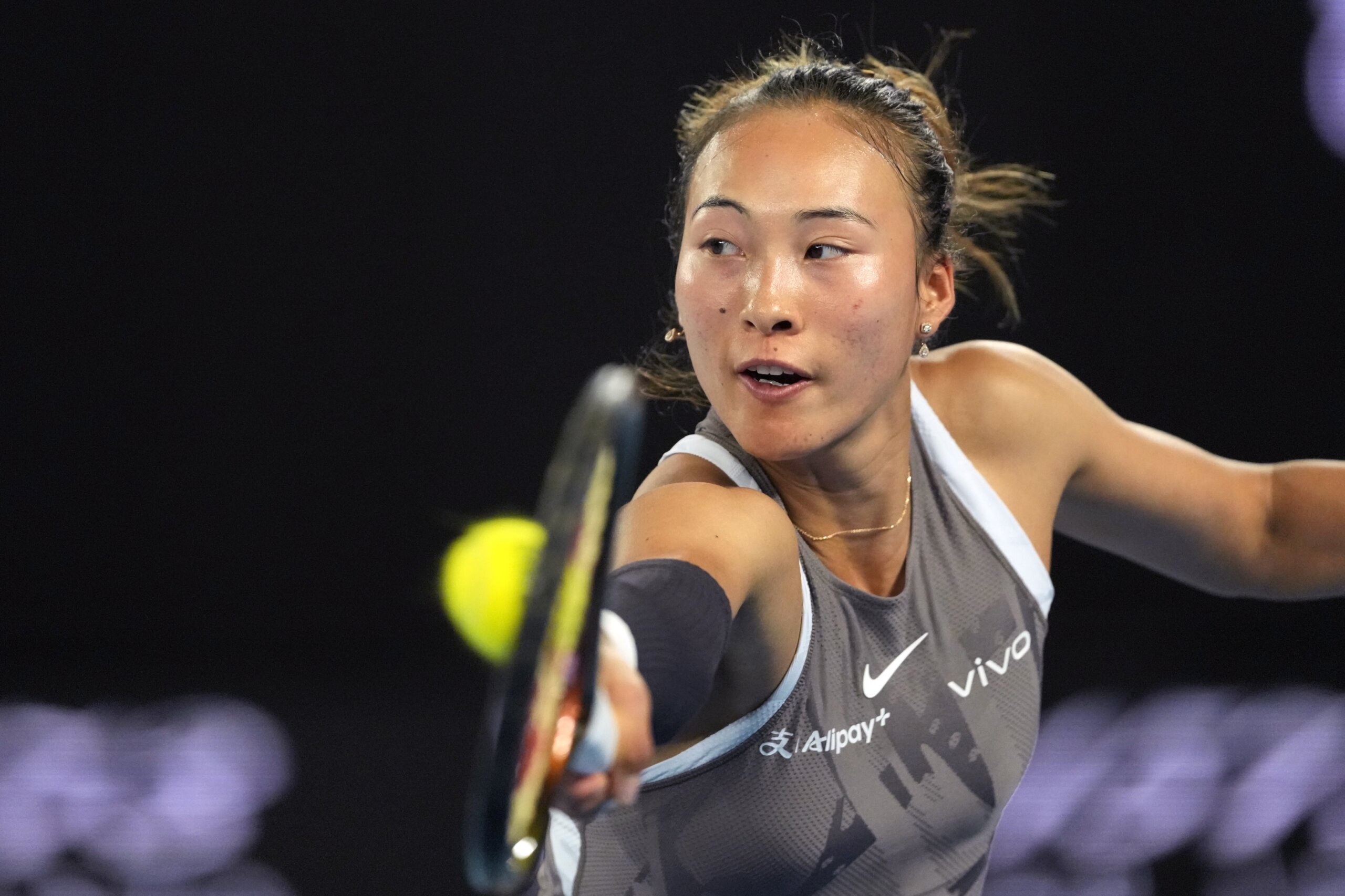 Australian Open: Olympic champ Zheng Qinwen starts her bid for another final on a rainy Day 1 - News