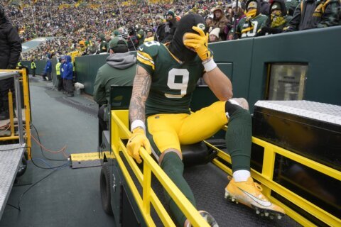 Packers WR Christian Watson carted into locker room. QB Jordan Love also hurt in game against Bears