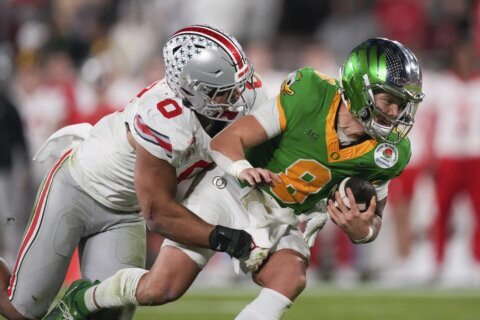 Top-seeded Oregon sees title hopes dashed with early knockout by Ohio State