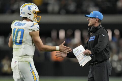 From stories to work shirts, how Jim Harbaugh’s approach has turned around the Los Angeles Chargers