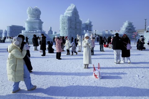 AP PHOTOS: Making art and fun from the ice, snow and freezing cold in Harbin, China