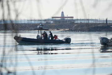 Emergency response units search near the crash site
