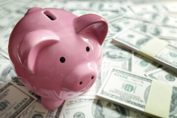 Piggy bank on money concept for business finance, investment and savings