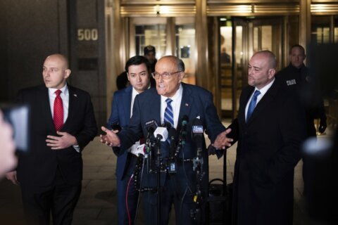 Judge will weigh holding Giuliani in contempt of court after jury’s $148 million defamation award