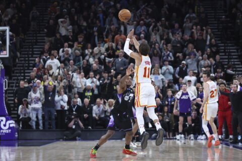 Trae Young’s 49-foot buzzer-beater lifts Hawks to a 124-121 win over the Jazz