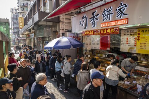 AP PHOTOS: Move over peanuts, pistachio is the latest trend for Hong Kong New Year treats