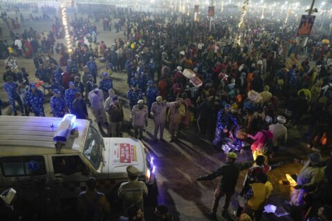 Dozens are injured in a stampede at the massive Maha Kumbh festival in India