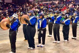 marching band perform on basketball court