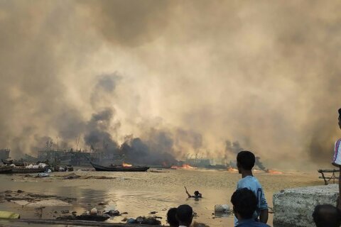 An army airstrike on a village in western Myanmar has killed at least 40 people, reports say