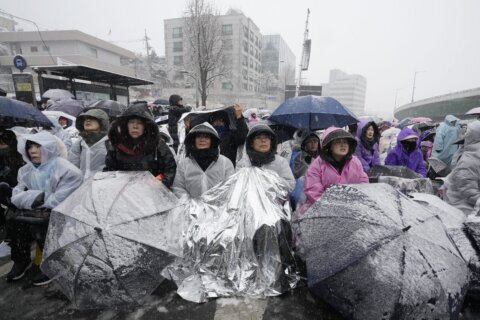 South Korean protesters brave cold to demand Yoon’s ouster as detention deadline looms