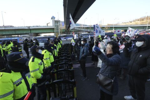 South Korea’s impeached president defies warrant in hourslong standoff