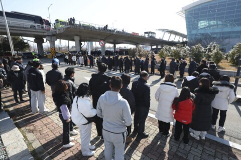 Grieving families of victims of South Korean plane crash visit site for a memorial service