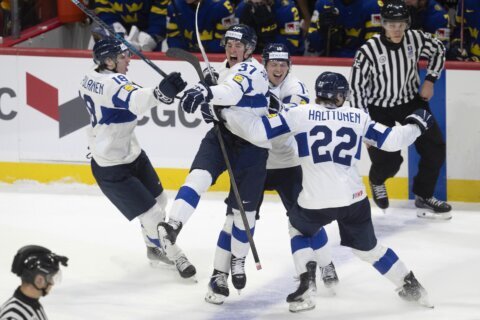 Finland beats Sweden 4-3 in overtime to reach world junior hockey title game