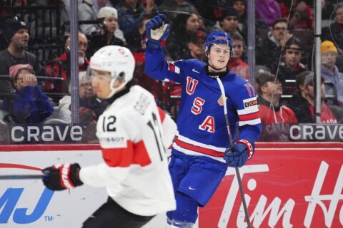 BC teammates Hagens, Leonard each score twice, US routs Switzerland 7-2 in world junior quarterfinal