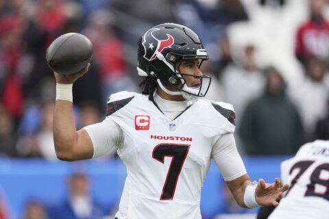 Playoff-bound Texans cruise to 23-14 win over the Titans, who land No. 1 draft pick