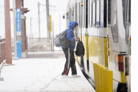 Winter storm plods into the Deep South, prompting states of emergency and school closures