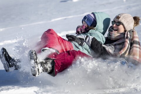 A frigid storm drops rare snow on Houston and New Orleans as Florida readies plows in the Panhandle