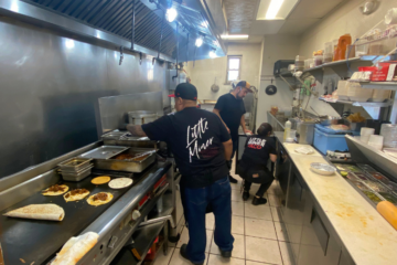 food workers inside kitchen