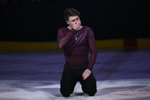 Tears flow at a poignant figure skating event in Washington benefiting victims of the DC plane crash