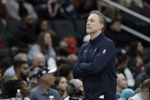 Tomlin scores career-high 26 as Cavaliers defeat Wizards 130-117 in regular-season finale