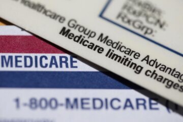 Medicare Advantage PPO card resting on top of a Medicare card