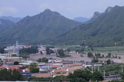 Heavy rain causes flooding, evacuations and at least 38 deaths around Beijing region
