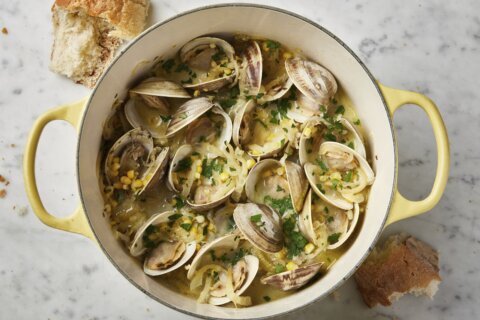 Crème fraîche creates a creamy broth in this recipe for briny-sweet steamed clams