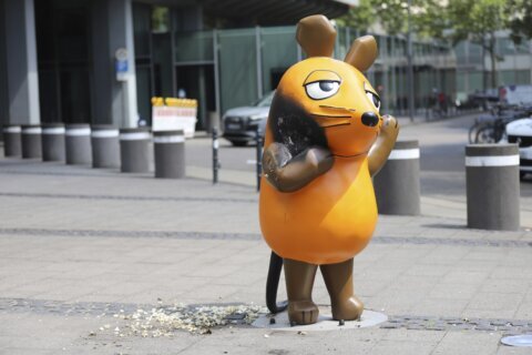 Vandals set fire to a mouse statue that’s a TV star and mascot for a German broadcaster