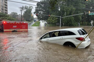 Fire truck and vehicle flooded in Silver Spring