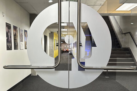 FILE - An entrance to the Arizona PBS offices in the Walter Cronkite School of Journalism and Mass Communication in Phoenix is photographed, May 2, 2025. (AP Photo/Katie Oyan, File)