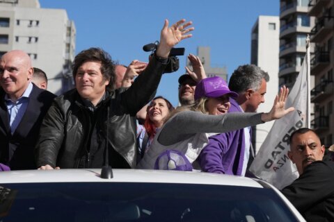 Argentina's libertarian president goes on defense as a corruption scandal spreads