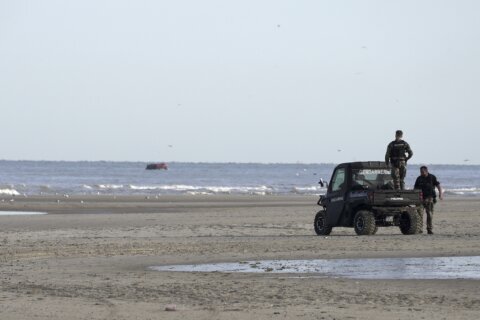 UK authorities detain 1st group of migrants under plan to thwart small boats crossing from France