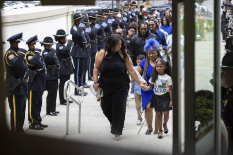 Law enforcement officers remember police officer killed in CDC shooting in Atlanta