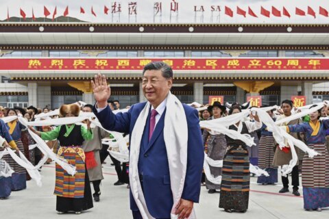 Grand ceremony and parade mark 60 years of Chinese Communist Party rule in Tibet