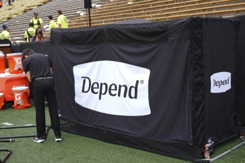Prime spot: Deion Sanders has a sideline bathroom at Colorado, sponsored by Depend undergarment