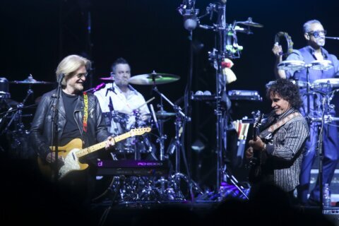 Business spat between Daryl Hall and John Oates has been resolved in arbitration, attorneys say