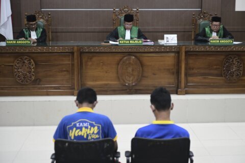 Islamic court in Indonesia sentences 2 men to public caning over sexual acts: kissing and hugging