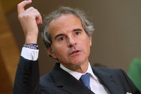 IAEA chief says Iran’s cooperation with inspectors is a ‘work in progress’ as sanctions loom