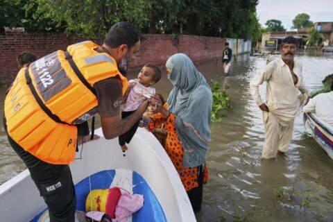 Flash floods leave 34 dead in Indian-controlled Kashmir as over 210,000 in Pakistan are displaced