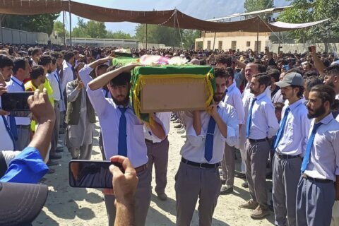 Massive mudslide kills 7 volunteers repairing flood damage in northern Pakistan