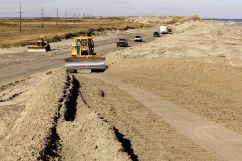 Hurricane Erin's massive waves threaten to isolate North Carolina's Outer Banks