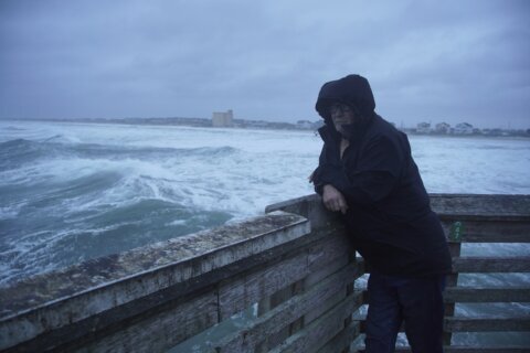 Erin weakens to post-tropical cyclone, moving out to sea as it batters East Coast with wind, waves