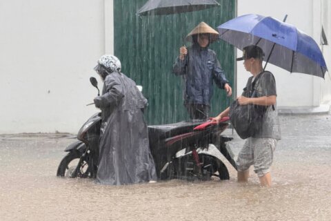 Tropical storm leaves 4 dead in Vietnam and brings heavy rain to the region