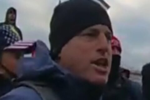 Justice Department employee who was prosecuted over Jan. 6 Capitol attack resigns