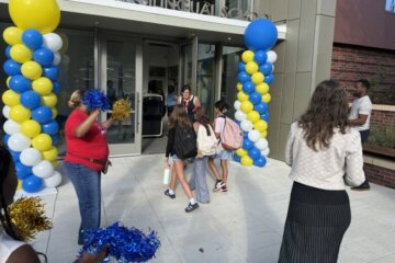 Students enter Stoddert Elementary School for the first day of classes.