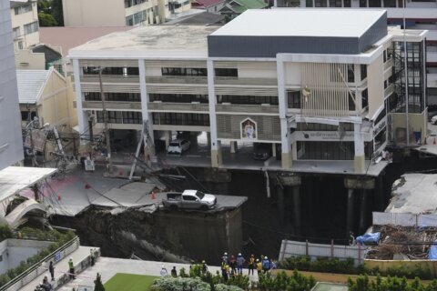 A Bangkok road collapse creates a sinkhole disrupting traffic and prompting evacuations