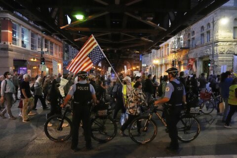 ICE officer fatally shoots suspect after being dragged by car near Chicago, officials say