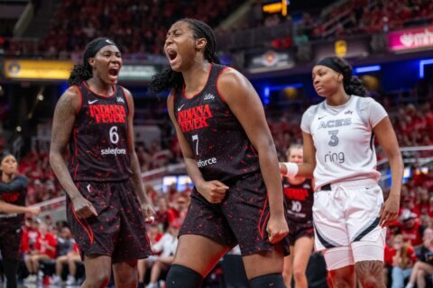 Aliyah Boston, Kelsey Mitchell lead Fever past Aces 90-83 to even series and set up decisive Game 5